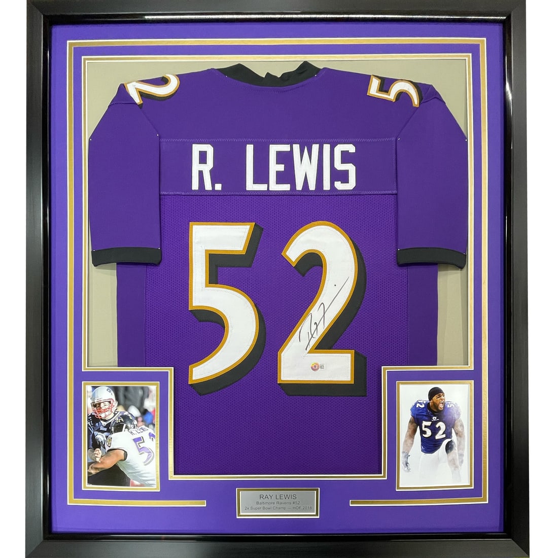 PSA DNA Ray Lewis signed framed Baltimore Ravens jersey 35x39: PSA DNA Ray Lewis signed framed Baltimore Ravens jersey 35x39 This framed display features a Ray Lewis autographed Baltimore Ravens purple jersey. The jersey is professionally framed and matted, accom