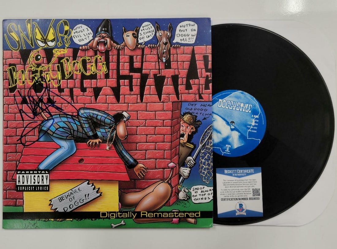 Doggystyle LP vinyl album autographed by Warren G with Beckett COA: Doggystyle LP vinyl album autographed by Warren G with Beckett COA This is an original Doggystyle vinyl record album LP, autographed by Warren G. The signature has been authenticated by Beckett, ensur