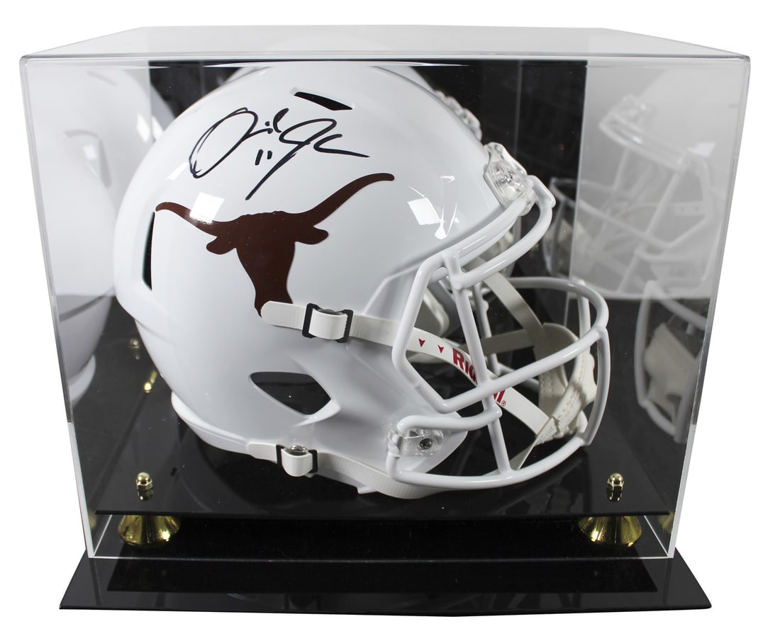Derrick Johnson Autographed Texas Longhorns Speed Replica Helmet With Display Case BAS: Derrick Johnson Autographed Texas Longhorns Speed Replica Helmet With Display Case BAS This Riddell full-size Speed replica helmet features the Texas Longhorns branding and has been personally signed 