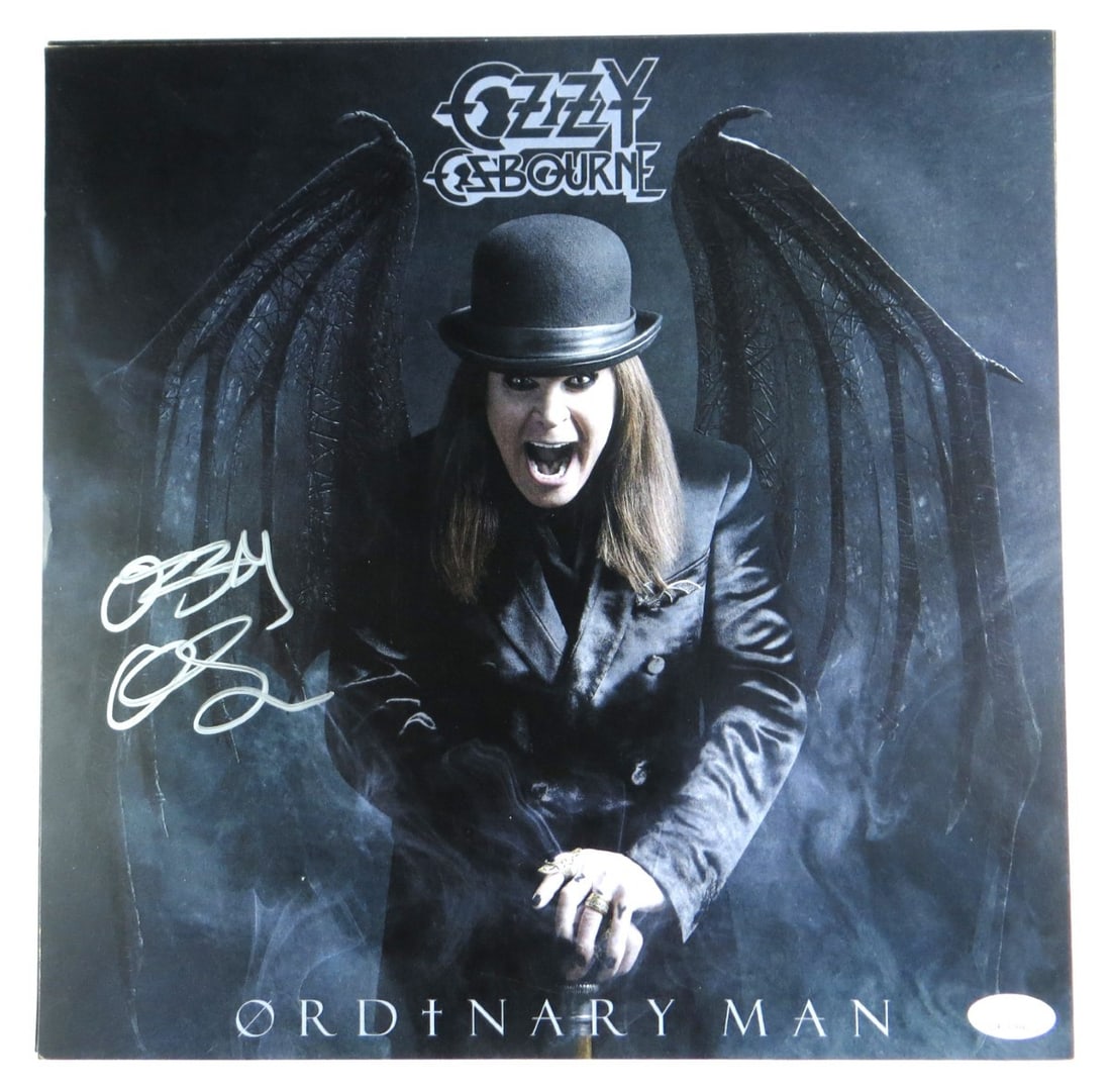 Ozzy Osbourne Autographed 12X12 Photo Print JSA Certified: Ozzy Osbourne Autographed 12X12 Photo Print JSA Certified This is an original 12X12 photograph print featuring Ozzy Osbourne, beautifully autographed by the legendary musician himself. The signature h