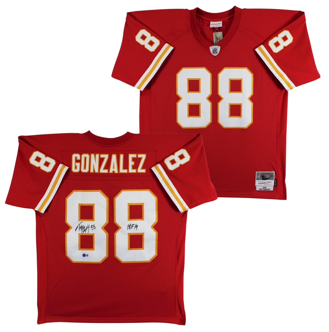 Tony Gonzalez Chiefs Mitchell Ness HOF 19 signed red jersey BAS witnessed: Tony Gonzalez Chiefs Mitchell Ness HOF 19 signed red jersey BAS witnessed This red Mitchell & Ness Kansas City Chiefs jersey has been personally signed by Tony Gonzalez and features the inscription "H