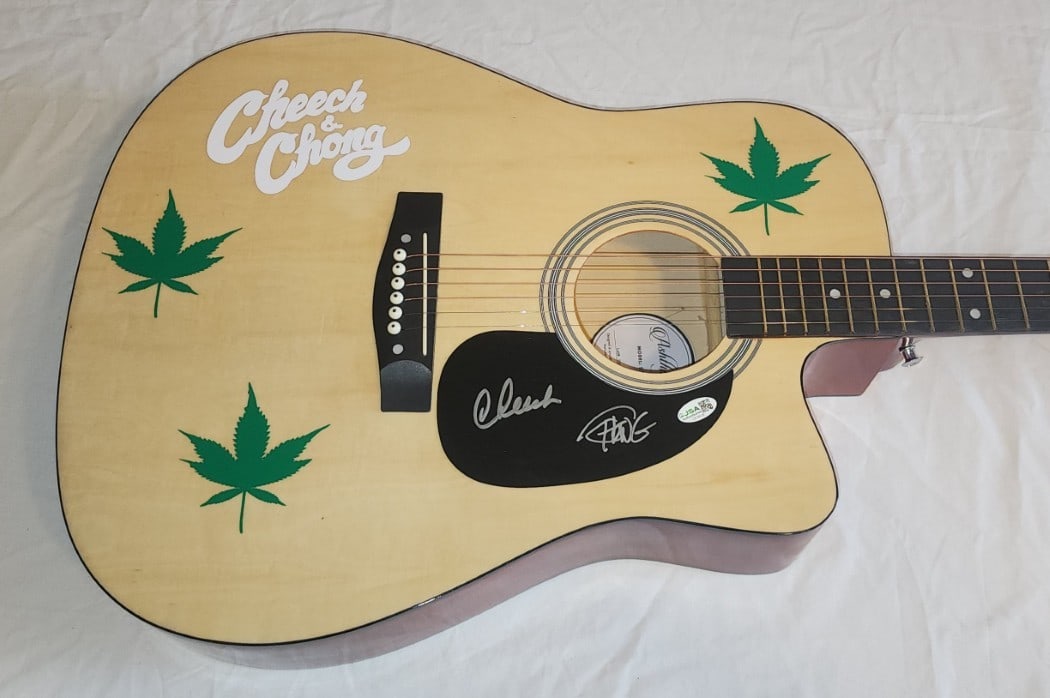 Cheech and Chong JSA Autographed Custom Guitar Up In Smoke: Cheech and Chong JSA Autographed Custom Guitar Up In Smoke This custom guitar has been autographed by Cheech & Chong and comes with authentication from James Spence (JSA). The guitar includes a JSA st