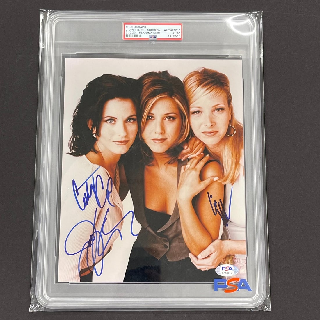 FRIENDS Signed Photo by Aniston Kudrow Cox PSA/DNA Certified: FRIENDS Signed Photo by Aniston Kudrow Cox PSA/DNA Certified This is a professionally printed photograph featuring the signatures of celebrated actresses Jennifer Aniston, Lisa Kudrow, and Courtney Co
