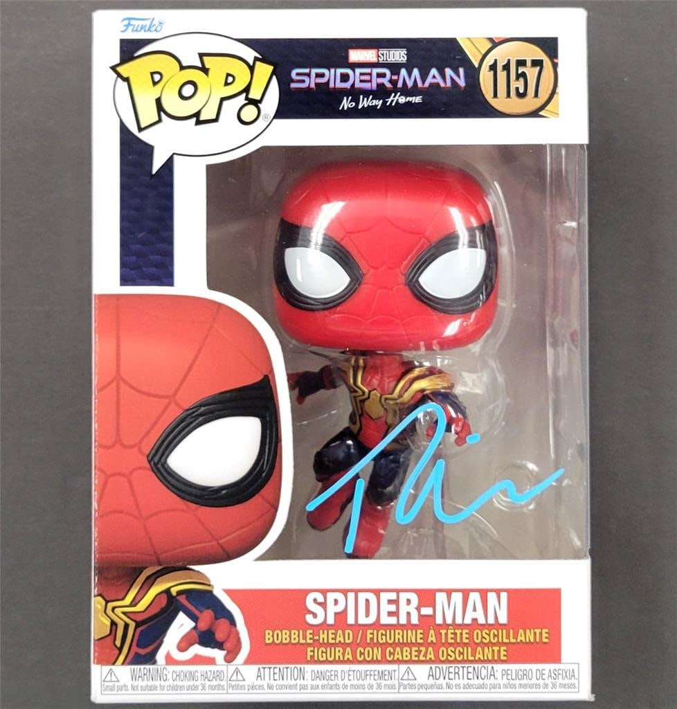 Spider-Man Funko Pop 1157 with Tobey Maguire Autograph Beckett Authenticated: Spider-Man Funko Pop 1157 with Tobey Maguire Autograph Beckett Authenticated This is an original Spider-Man Marvel Funko Pop #1157, autographed by Tobey Maguire. The signature has been authenticated b