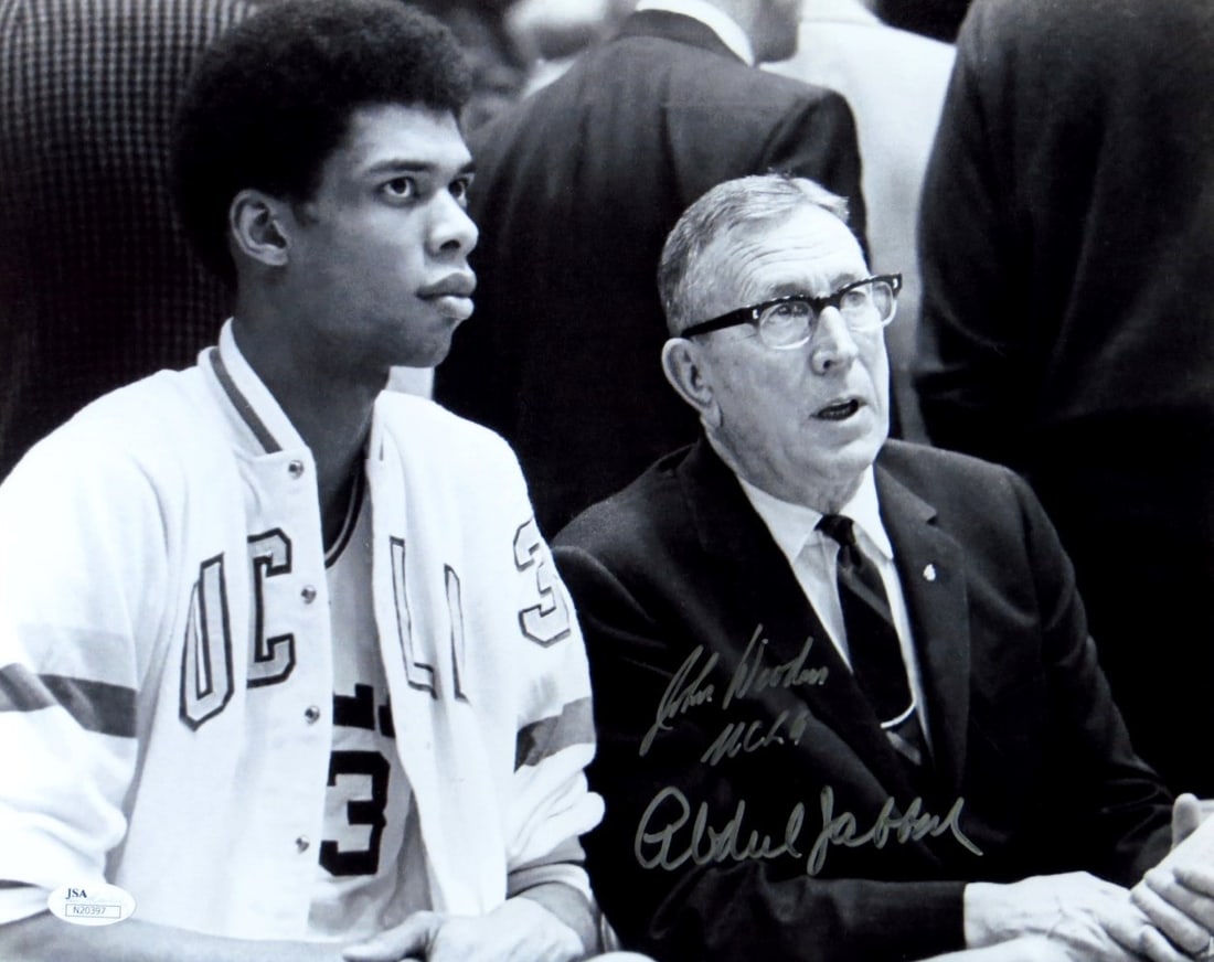 Kareem Abdul Jabbar John Wooden Signed 11x14 Photo JSA Authenticated UCLA: Kareem Abdul Jabbar John Wooden Signed 11x14 Photo JSA Authenticated UCLA This is an original 11x14 photo autographed by Kareem Abdul Jabbar and John Wooden, both legendary figures associated with the