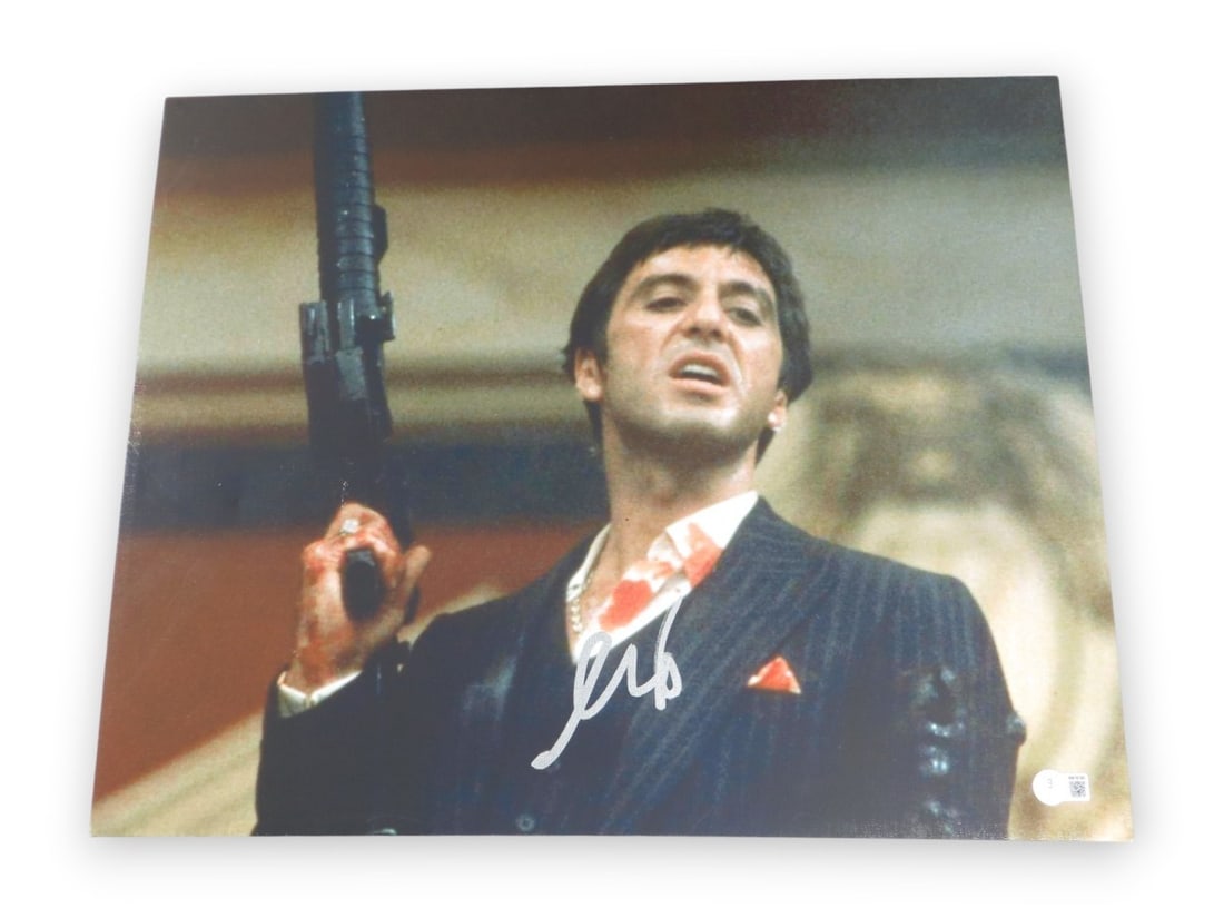 Al Pacino autographed Scarface gun photo on 16X20 canvas BAS: Al Pacino autographed Scarface gun photo on 16X20 canvas BAS Autographed 16x20 canvas photo signed by Al Pacino, featuring Scarface holding a gun. The canvas is professionally mounted and ready for fr