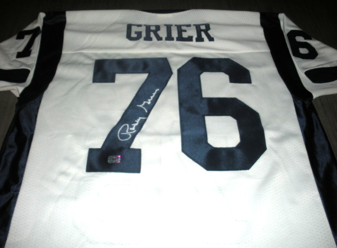 Rosey Grier Signed Los Angeles Rams Jersey with COA: Rosey Grier Signed Los Angeles Rams Jersey with COA Celebrate your passion for football with this rare, officially licensed Los Angeles Rams jersey, signed by Rosey Grier. This original piece comes wi