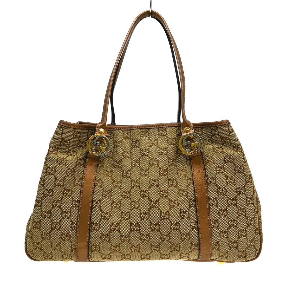 Gucci GG Medium Canvas Leather Tote in Beige Brown: Gucci GG Medium Canvas Leather Tote in Beige Brown Vintage Gucci GG tote bag in beige and brown with a canvas and leather exterior. This medium women's tote features a brown canvas handle, brown canva