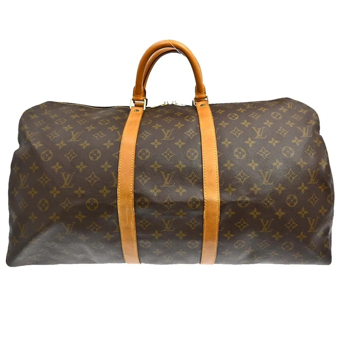 Louis Vuitton Keepall travel bag in brown monogram canvas: Louis Vuitton Keepall travel bag in brown monogram canvas Louis Vuitton Keepall in brown monogram canvas. This unisex bag is in good condition with visible wear, including scuffs, suntanning, discolor