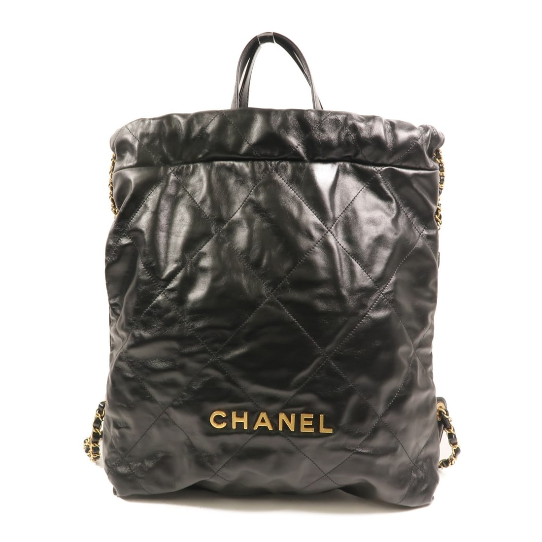 Chanel 22 Black Calfskin Leather Backpack with Gold CC Chain Detail: Chanel 22 Black Calfskin Leather Backpack with Gold CC Chain Detail This CHANEL 22 backpack features a black calfskin leather exterior with a chain detail and CC logo. Designed in a classic rucksack s