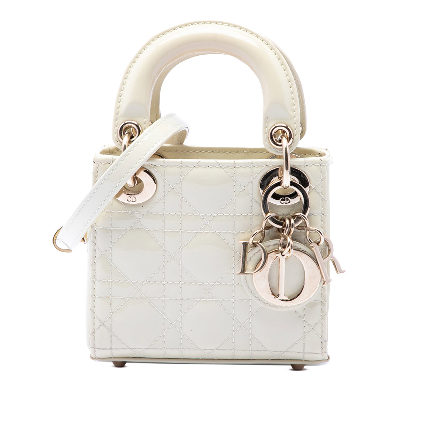 Dior Micro Cannage Lady Dior White Patent Leather Bag: Dior Micro Cannage Lady Dior White Patent Leather Bag This Micro Patent Cannage Lady Dior bag showcases a quilted patent leather exterior in white, complemented by flat top handles and a detachable fl