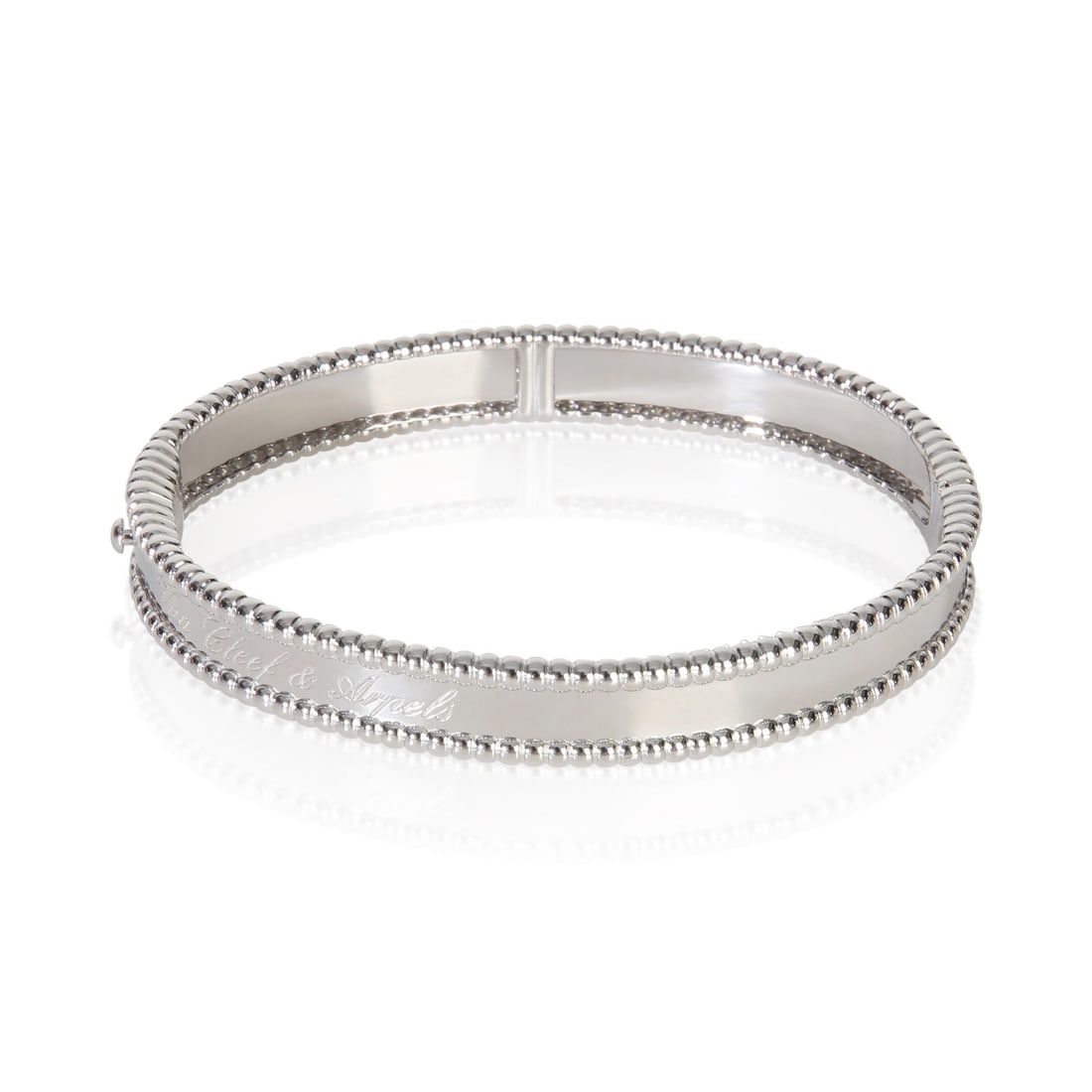 Van Cleef Arpels Signature Perlee 18k White Gold Bracelet: Van Cleef Arpels Signature Perlee 18k White Gold Bracelet This Van Cleef & Arpels Signature Perlee bracelet is crafted from 18k white gold and features a classic box clasp with tongue and safety. Desi