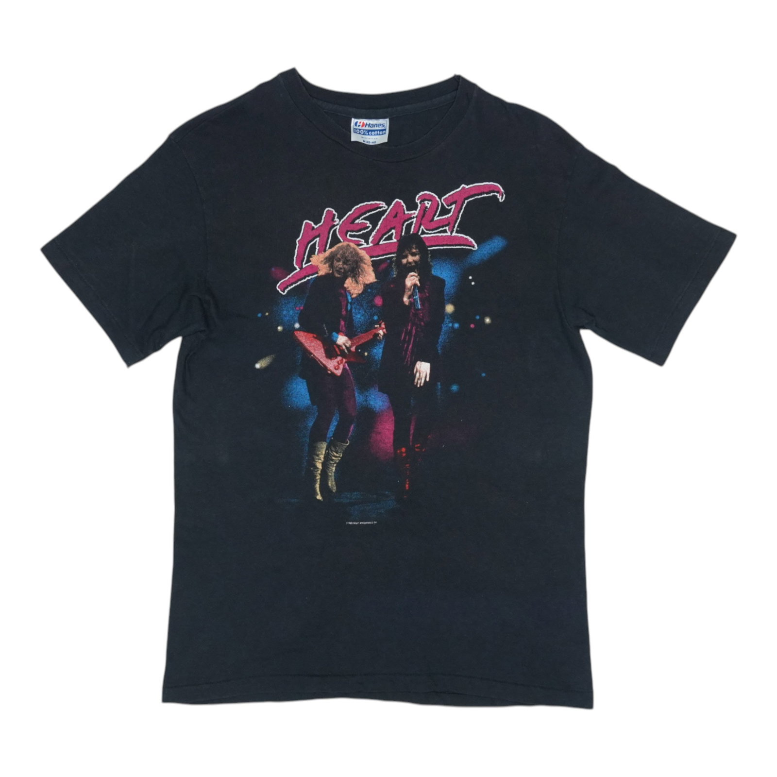 Vintage 1984 Heart Passion Tour Black Cotton Band T-Shirt: Vintage 1984 Heart Passion Tour Black Cotton Band T-Shirt This is an original vintage 1984 Heart Passion World Tour shirt. Made from 100% cotton, it features front and back graphics and is presented i