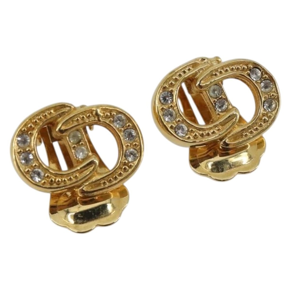 Christian Dior Gold Tone Metal Women's Earring: Christian Dior Gold Tone Metal Women's Earring Authentic Christian Dior women's earring in gold-tone metal. This piece has a clean, classic look and is offered in excellent condition with light partia