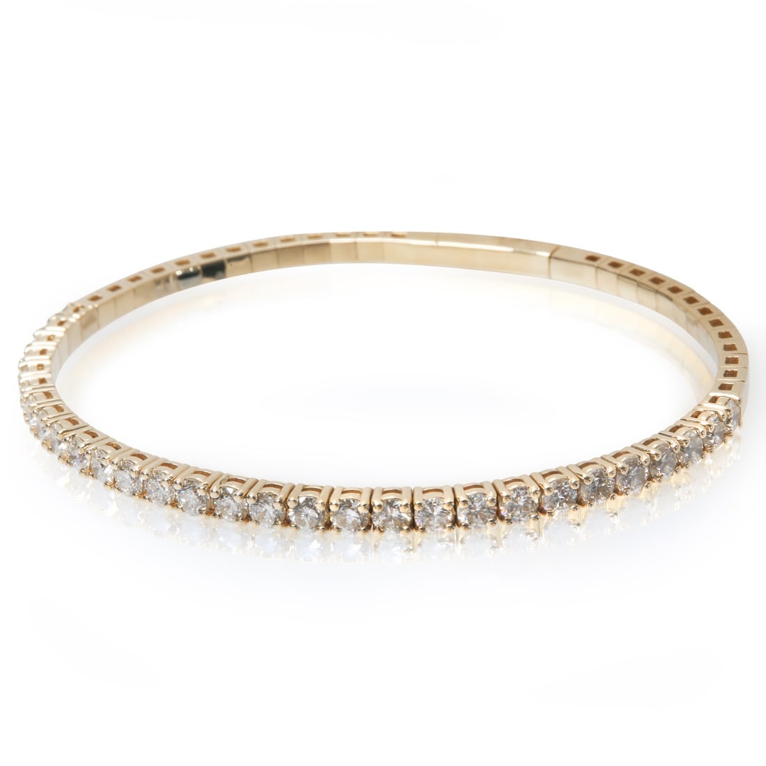 14k Yellow Gold Flexible Bangle Bracelet with 3.00 Ctw Diamonds: 14k Yellow Gold Flexible Bangle Bracelet with 3.00 Ctw Diamonds Pre-owned women's flexible bangle bracelet crafted in 14k yellow gold and set with round brilliant white diamonds. This bracelet feature