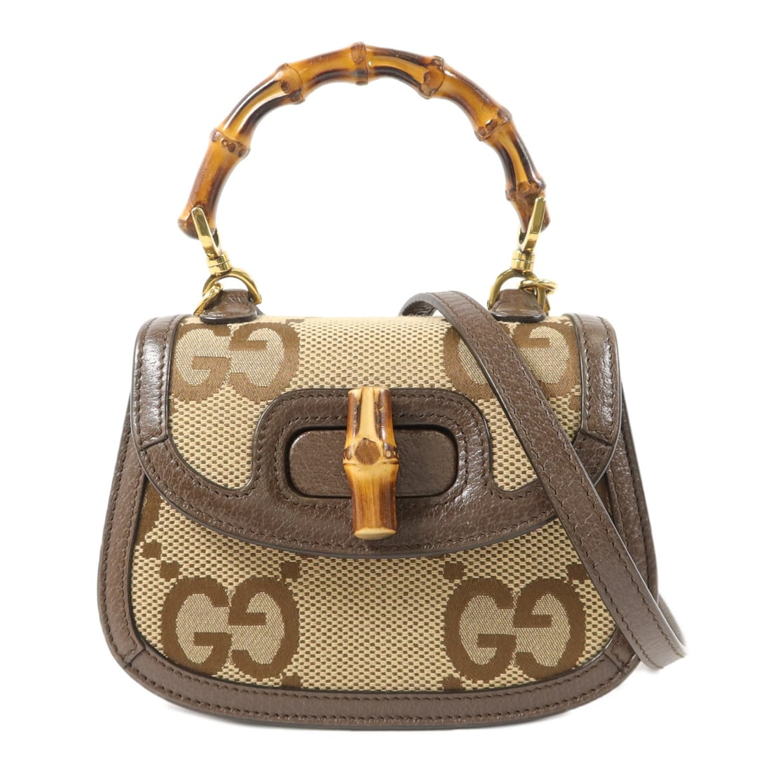 Gucci Bamboo 1947 Brown Canvas 2 Way Shoulder Bag: Gucci Bamboo 1947 Brown Canvas 2 Way Shoulder Bag This Gucci GG Bamboo 1947 2-way shoulder bag features a brown canvas exterior with gold-tone hardware and bamboo accents. Designed for versatility, it
