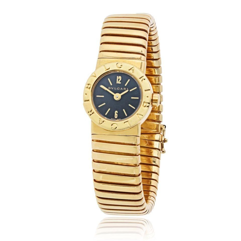 18K Yellow Gold Tubogas BB 19 2T Quartz Timepiece by Bvlgari: 18K Yellow Gold Tubogas BB 19 2T Quartz Timepiece by Bvlgari The Bvlgari BB 19 2T Tubogas watch is crafted in 18K yellow gold and features the signature flexible bangle design. It has a round case wit
