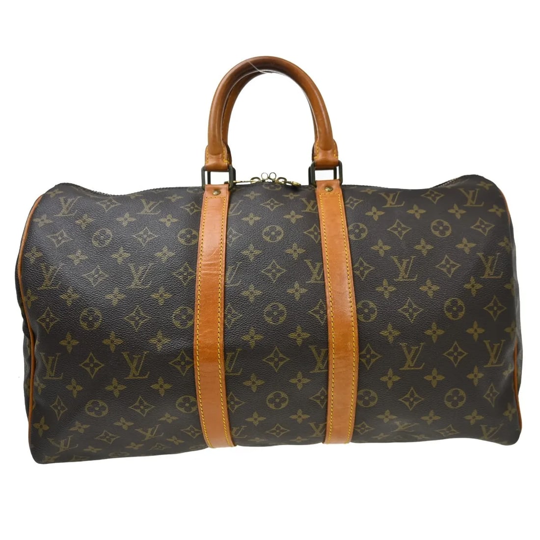 Louis Vuitton Keepall Brown Monogram Canvas Travel Bag: Louis Vuitton Keepall Brown Monogram Canvas Travel Bag Louis Vuitton Keepall in brown monogram canvas. This unisex bag is made in France and remains in good condition with visible wear consistent with