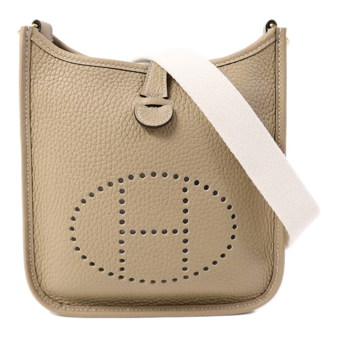 Hermes Evelyne TPM beige calfskin shoulder bag GHW: Hermes Evelyne TPM beige calfskin shoulder bag GHW This Hermes Evelyne TPM shoulder bag is crafted from Clemence calfskin leather in a beige (Trench/Blanc) color. It features gold-tone hardware and is