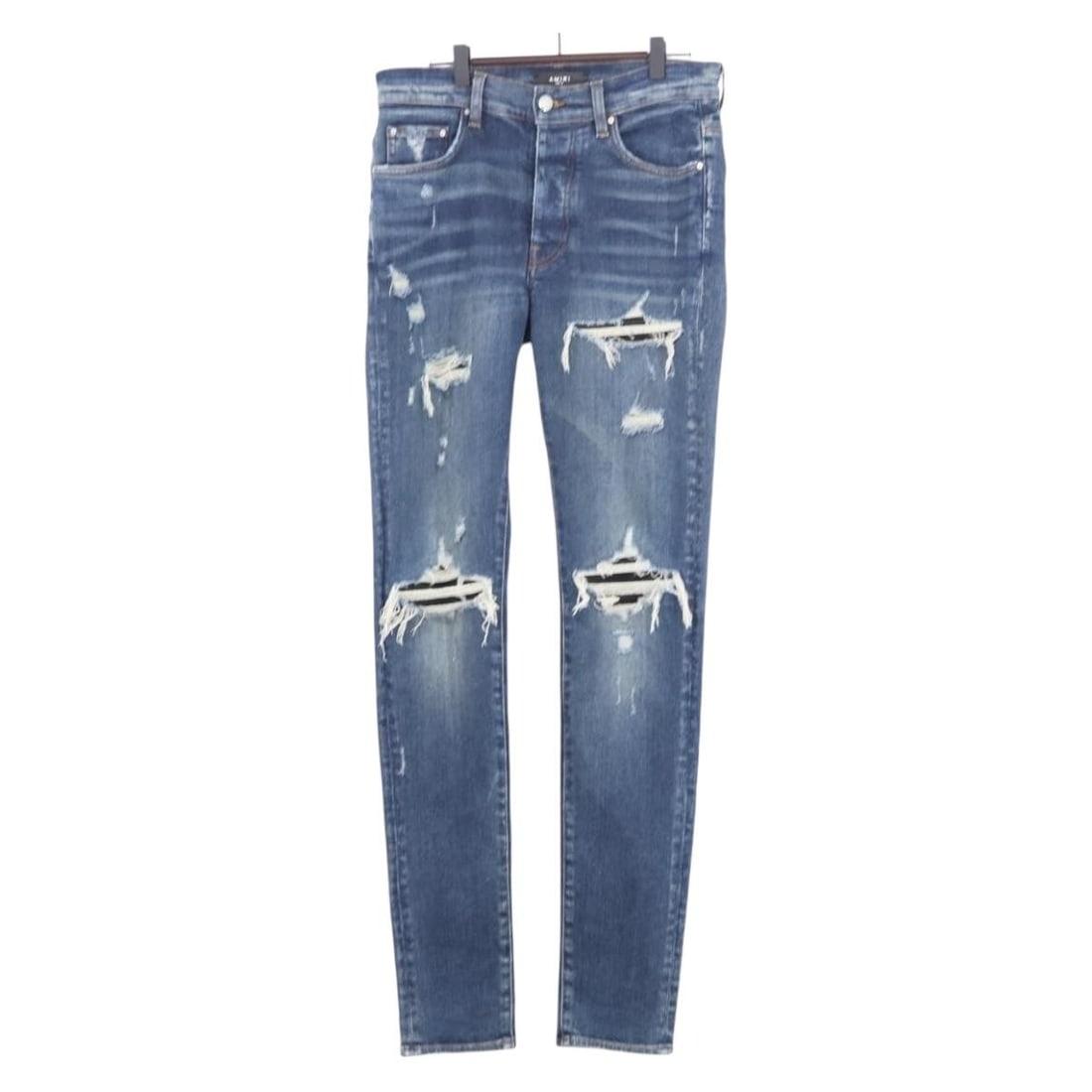 AMIRI navy cotton distressed denim pants size 32: AMIRI navy cotton distressed denim pants size 32 Authentic AMIRI distressed denim pants in navy cotton. This women's style is made in the USA and shows reasonable wear consistent with condition rank B