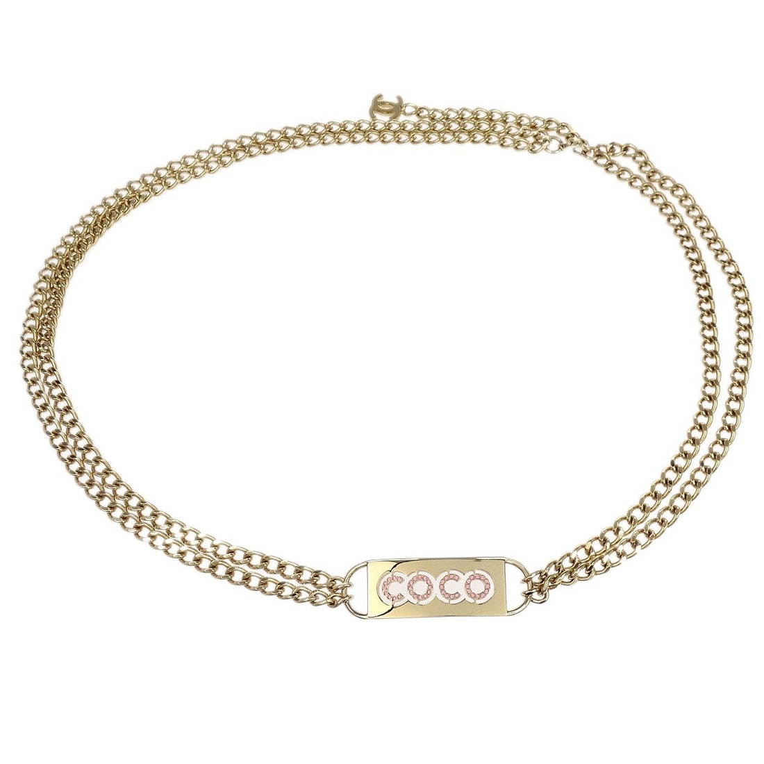 CHANEL 02P Gold Tone Chain Belt with Rhinestone Charm: CHANEL 02P Gold Tone Chain Belt with Rhinestone Charm Chanel chain belt with rhinestone accents and a Chanel charm. This women's adjustable belt is finished in gold tone and marked 02P. It comes with 