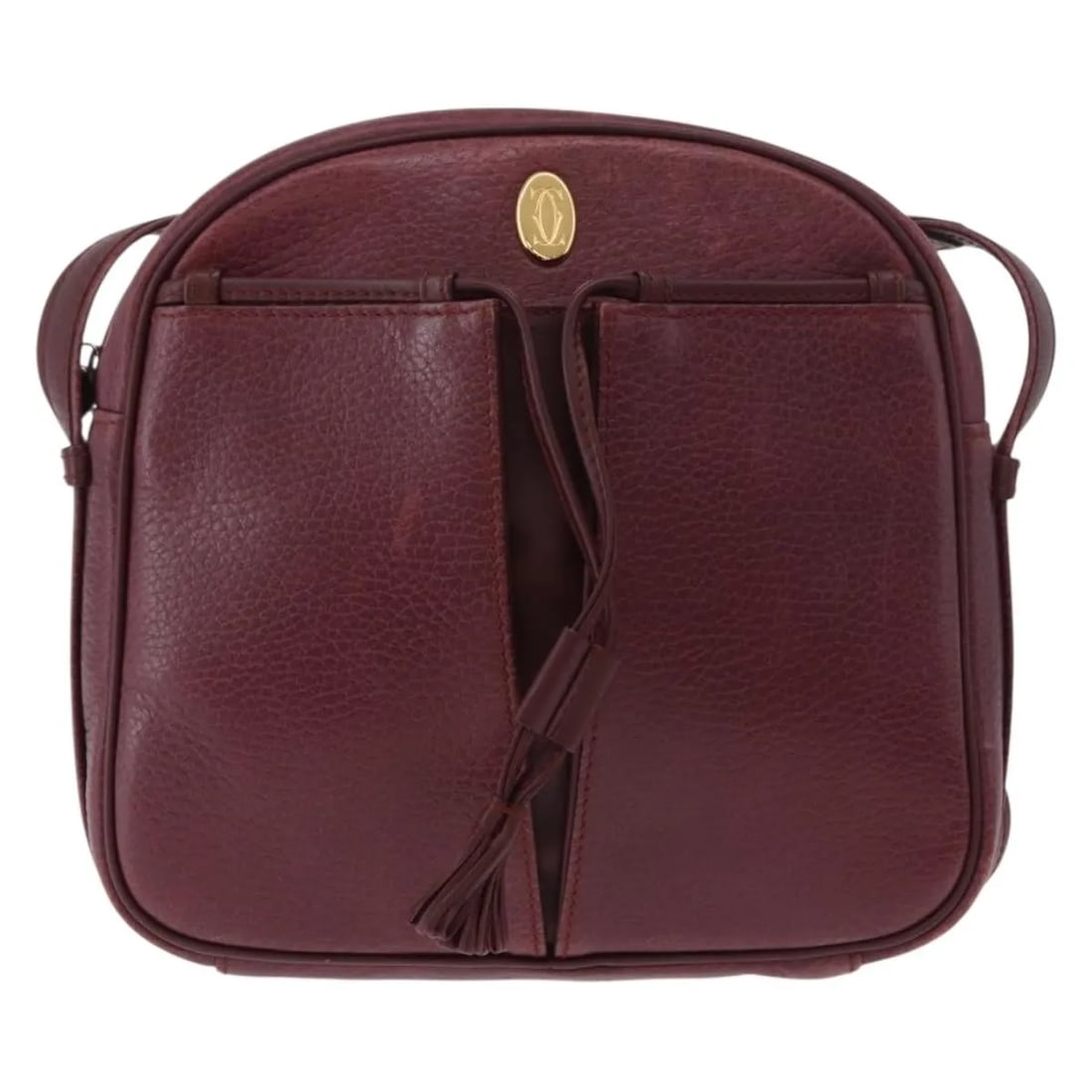 Cartier Must de Cartier Tasseled Burgundy Leather Crossbody Bag: Cartier Must de Cartier Tasseled Burgundy Leather Crossbody Bag This is a Cartier Tasseled Must de Cartier Crossbody Bag crafted in burgundy leather. The bag features a tassel detail and is designed f