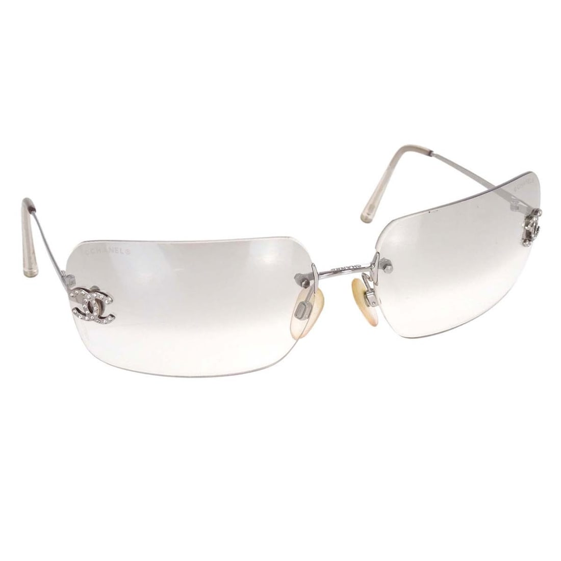 CHANEL CC Logos Women's Brown Lens Rhinestone Sunglasses Silver Frame: CHANEL CC Logos Women's Brown Lens Rhinestone Sunglasses Silver Frame Chanel women's sunglasses with brown acrylic lenses and a silver-tone acrylic frame accented with rhinestones and CC logo styling.