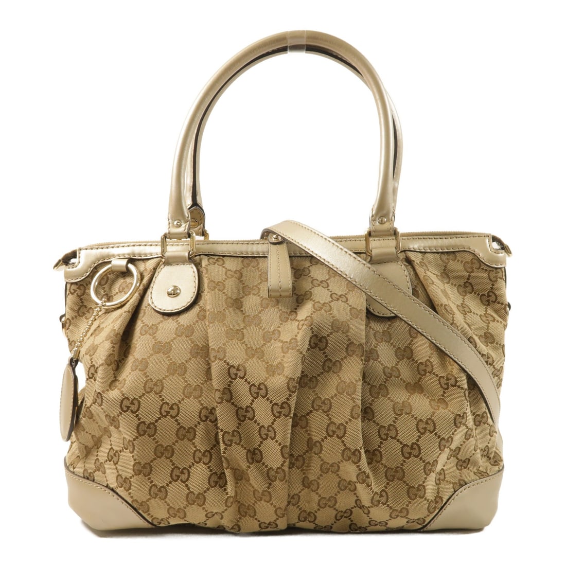 Gucci Brown GG Canvas Calfskin 2 Way Shoulder Bag with Gold Hardware: Gucci Brown GG Canvas Calfskin 2 Way Shoulder Bag with Gold Hardware This Gucci 2-way shoulder bag features the iconic GG canvas and brown calfskin leather, designed for versatile wear. The bag offers