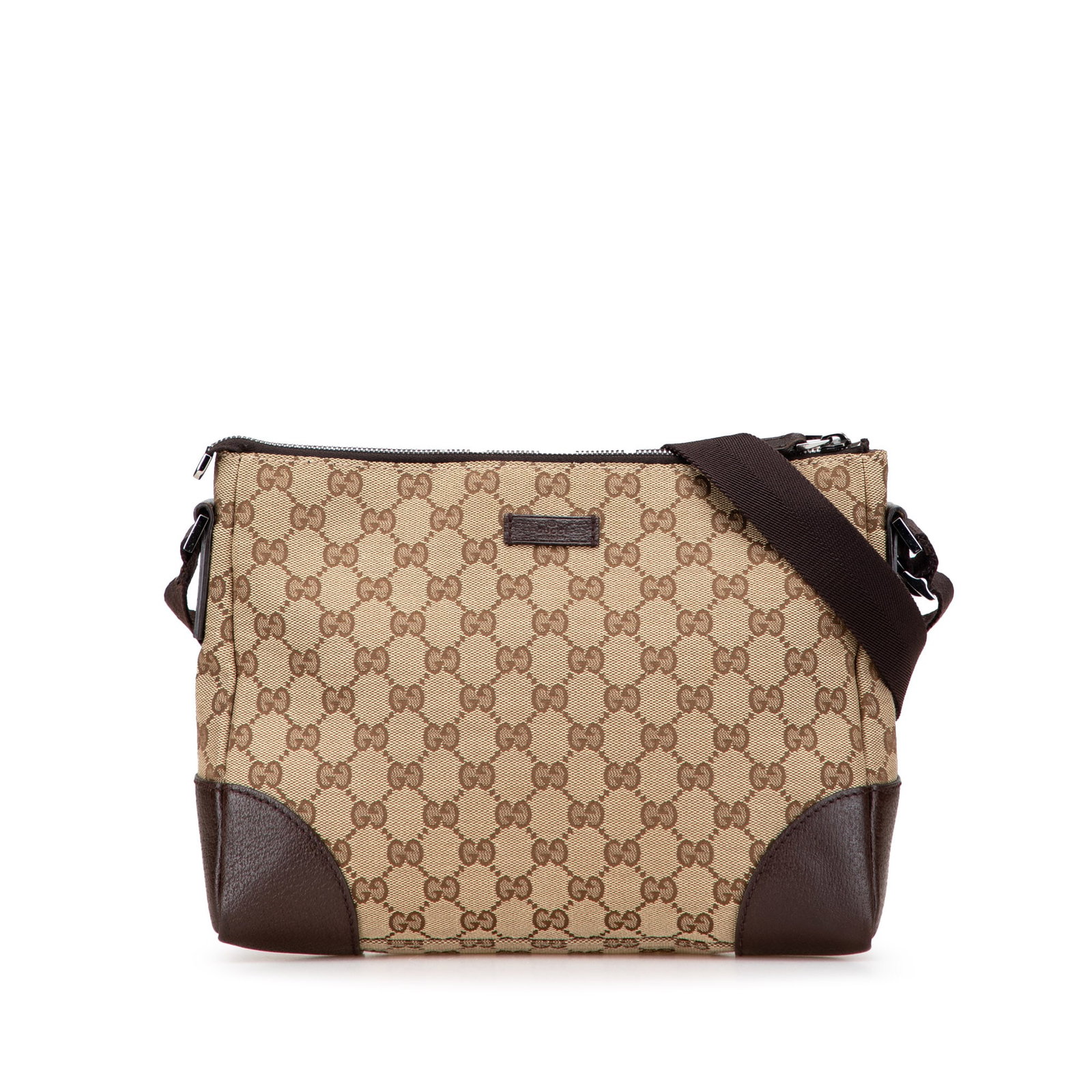 Gucci GG Canvas Crossbody Bag with Leather Trim: Gucci GG Canvas Crossbody Bag with Leather Trim Introducing the Gucci GG Canvas Crossbody, a chic and practical addition to your accessory collection. This stylish crossbody bag is crafted from durabl