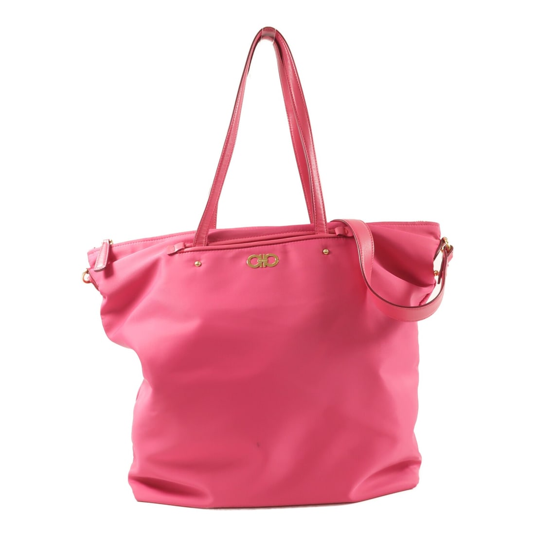 Salvatore Ferragamo Pink Nylon Tote With Gold Hardware Two Way Shoulder Bag: Salvatore Ferragamo Pink Nylon Tote With Gold Hardware Two Way Shoulder Bag This Salvatore Ferragamo 2-way shoulder tote bag features a durable pink nylon exterior and offers versatile carrying option