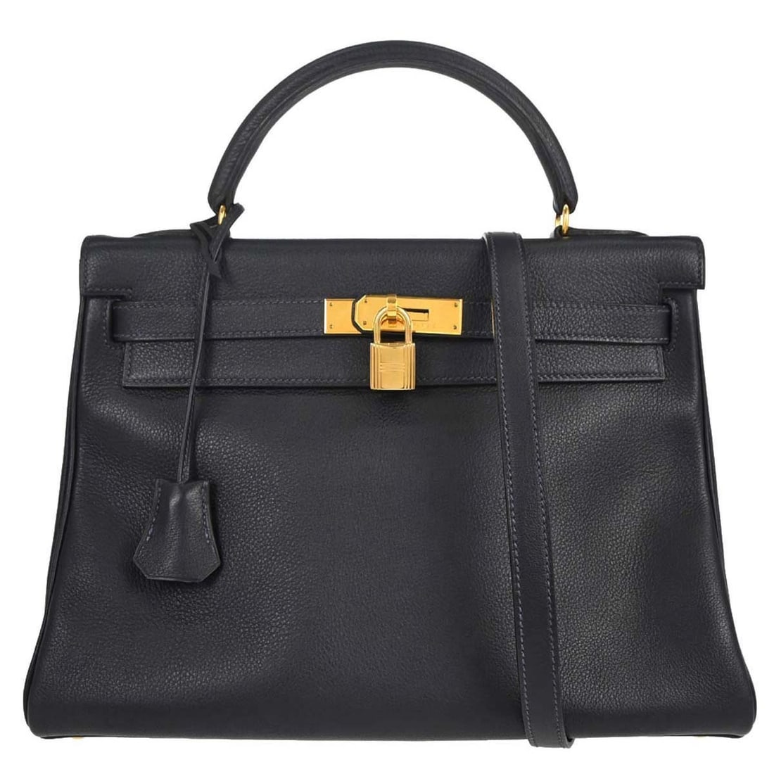 Hermes Kelly 32 Retourne Blue Indigo Togo Leather 2way Bag: Hermes Kelly 32 Retourne Blue Indigo Togo Leather 2way Bag Hermes Kelly 32 Retourne 2-way handbag in Blue Indigo Togo leather with a turn-lock flap closure. This medium satchel/top handle bag features