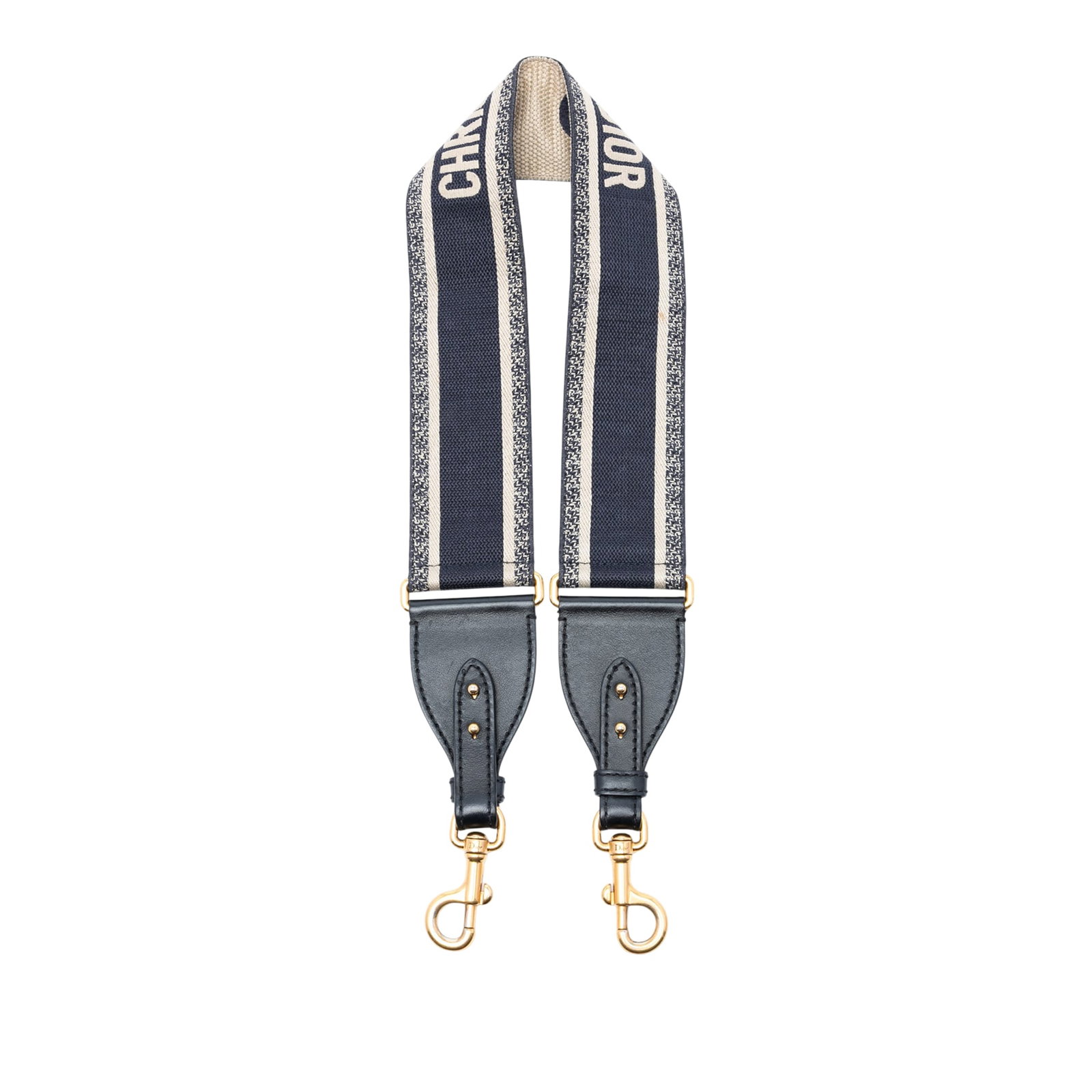 Dior Blue Canvas Shoulder Strap with Leather Trim: Dior Blue Canvas Shoulder Strap with Leather Trim This Dior shoulder strap showcases a blue embroidered canvas body accented with leather trim and gold-tone metal clasp closures. Made in Italy, this a