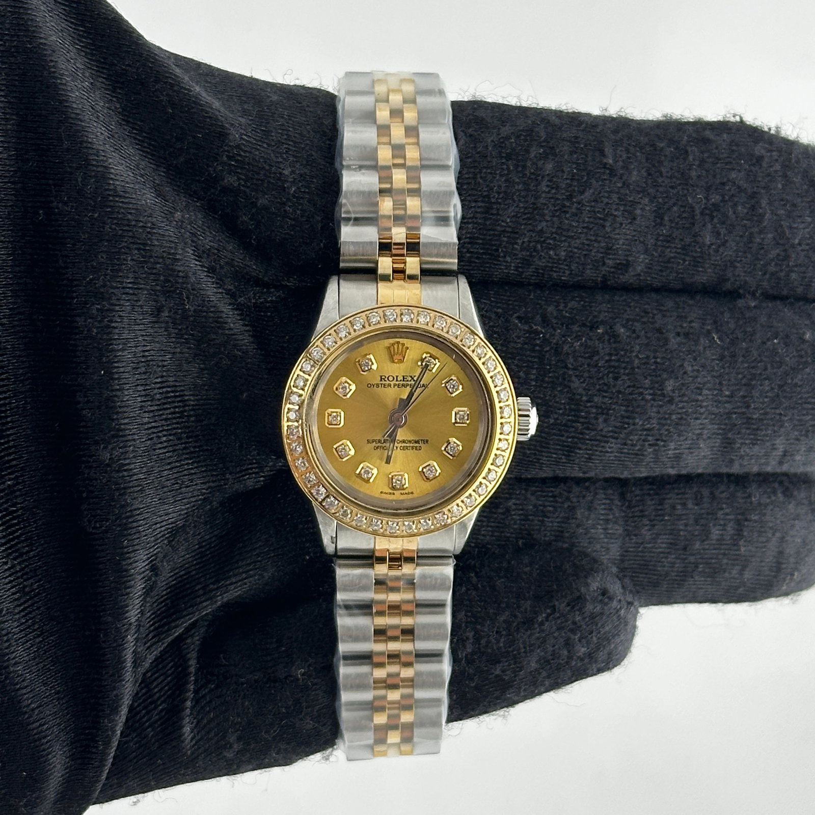 Rolex Oyster Perpetual Ladies Champagne Diamond Dial Jubilee Bracelet Ref 6410: Rolex Oyster Perpetual Ladies Champagne Diamond Dial Jubilee Bracelet Ref 6410 This ladies Rolex Oyster Perpetual features an aftermarket champagne dial set with diamonds and an aftermarket Jubilee br
