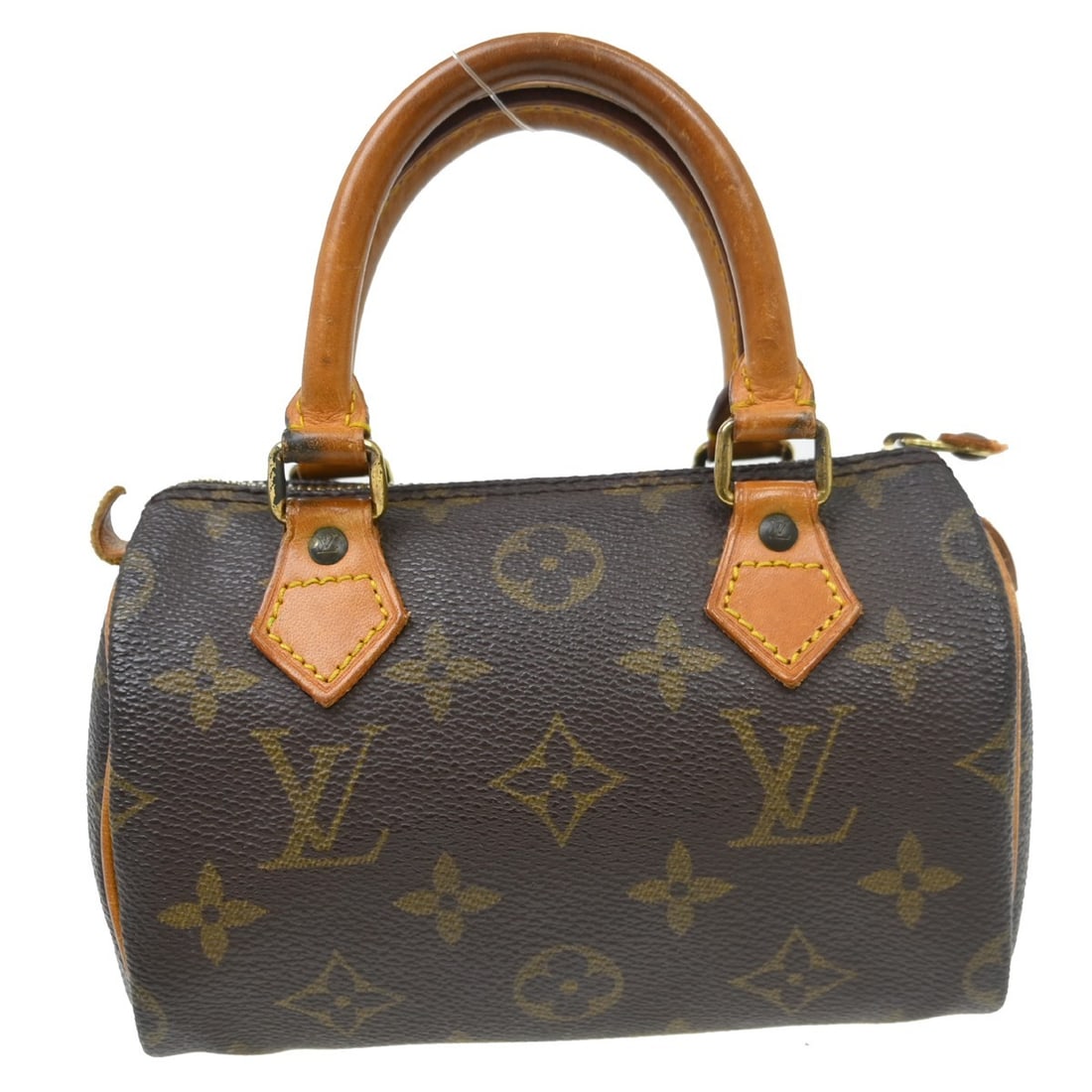 Louis Vuitton Speedy Mini Monogram Handbag M41534 TH1913: Louis Vuitton Speedy Mini Monogram Handbag M41534 TH1913 Vintage Louis Vuitton Mini Speedy handbag in brown Monogram canvas with leather trim and a zip closure. This women's handbag shows reasonable w