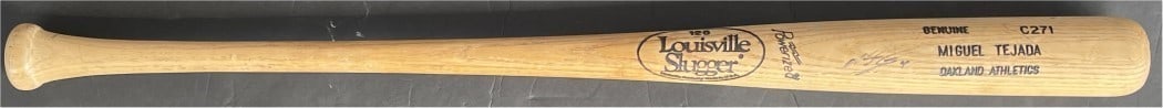 Miguel Tejada Autographed Baseball Bat Athletics JSA Certified: Miguel Tejada Autographed Baseball Bat Athletics JSA Certified This is an original autographed baseball bat by Miguel Tejada, a prominent player of the Oakland Athletics. The bat is authenticated by J