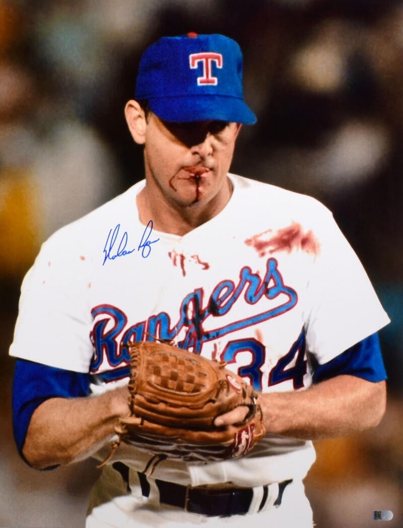 Signed Nolan Ryan Texas Rangers 16x20 Bloody Lip Baseball Photo AIV Hologram Blue: Signed Nolan Ryan Texas Rangers 16x20 Bloody Lip Baseball Photo AIV Hologram Blue This is a pre-owned 16x20 photograph featuring Nolan Ryan of the Texas Rangers, signed by the player. The photo captur