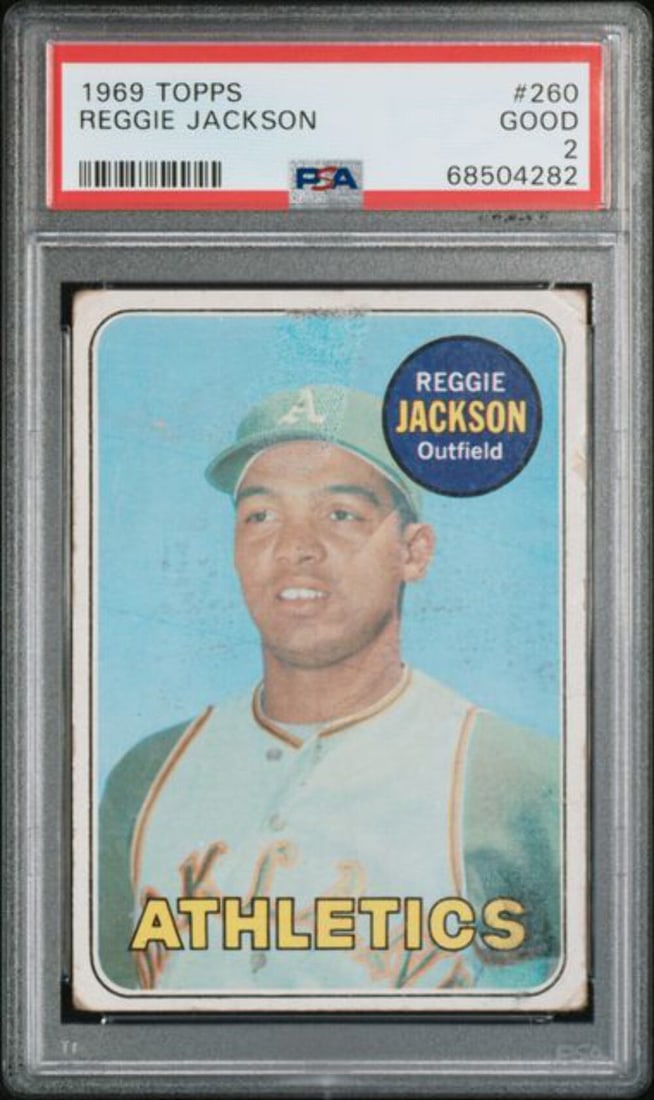 1969 Topps Reggie Jackson #260 Rookie Baseball Card PSA Graded 2: 1969 Topps Reggie Jackson #260 Rookie Baseball Card PSA Graded 2 This is a graded 1969 Topps Reggie Jackson #260 Rookie baseball card, encapsulated and authenticated by Professional Sports Authenticat