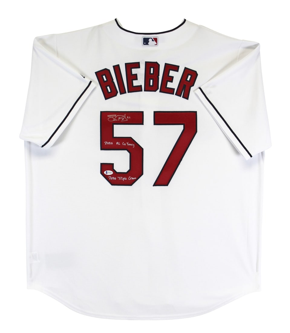 Shane Bieber Signed Cleveland Indians Jersey with 2020 AL Cy Young Inscription: Shane Bieber Signed Cleveland Indians Jersey with 2020 AL Cy Young Inscription This autographed white Majestic Cool Base jersey has been personally signed by Shane Bieber of the Cleveland Indians and 