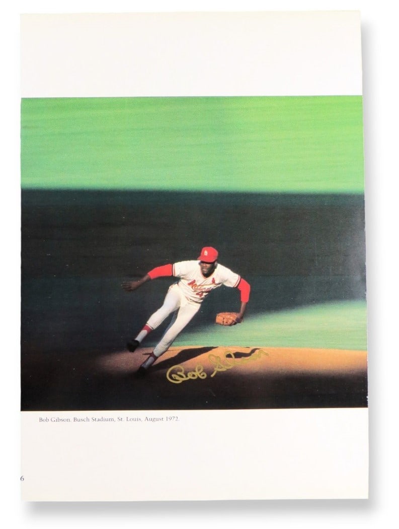 Bob Gibson Frank Robinson Signed Photo 8.25 x 11.75 JSA Authenticated: Bob Gibson Frank Robinson Signed Photo 8.25 x 11.75 JSA Authenticated This unique collectible features an autographed book photo of baseball legends Bob Gibson and Frank Robinson, both signed on custo