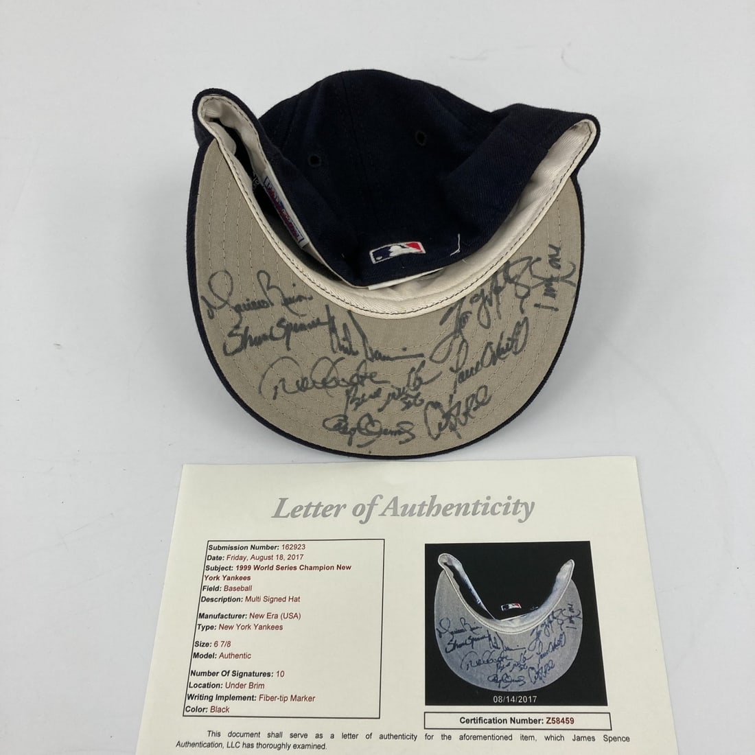 1999 Yankees Signed Hat Jeter Rivera COA JSA Autographed: 1999 Yankees Signed Hat Jeter Rivera COA JSA Autographed Celebrate the iconic 1999 World Series Champion New York Yankees with this signed hat featuring the autographs of legendary players Derek Jeter
