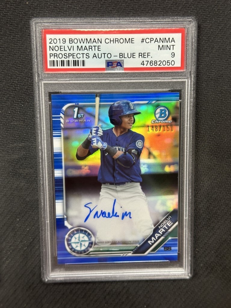 PSA 9 2019 Blue Refractor Auto Noelvi Marte Baseball Card #CPANMA: PSA 9 2019 Blue Refractor Auto Noelvi Marte Baseball Card #CPANMA This is a 2019 Bowman Chrome Blue Refractor autograph card featuring Noelvi Marte of the Seattle Mariners. The card has been professio