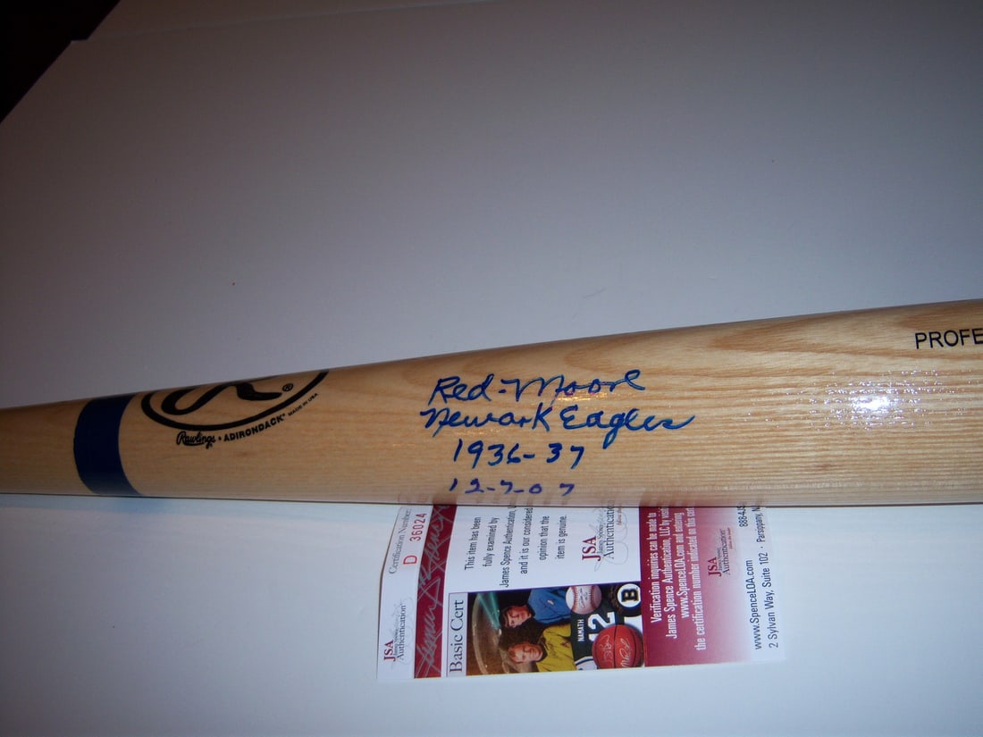 Signed Newark Eagles baseball bat James Red Moore JSA COA: Signed Newark Eagles baseball bat James Red Moore JSA COA This pre-owned baseball bat is signed by James Red Moore of the Newark Eagles. It is an original item from the United States and comes with JS