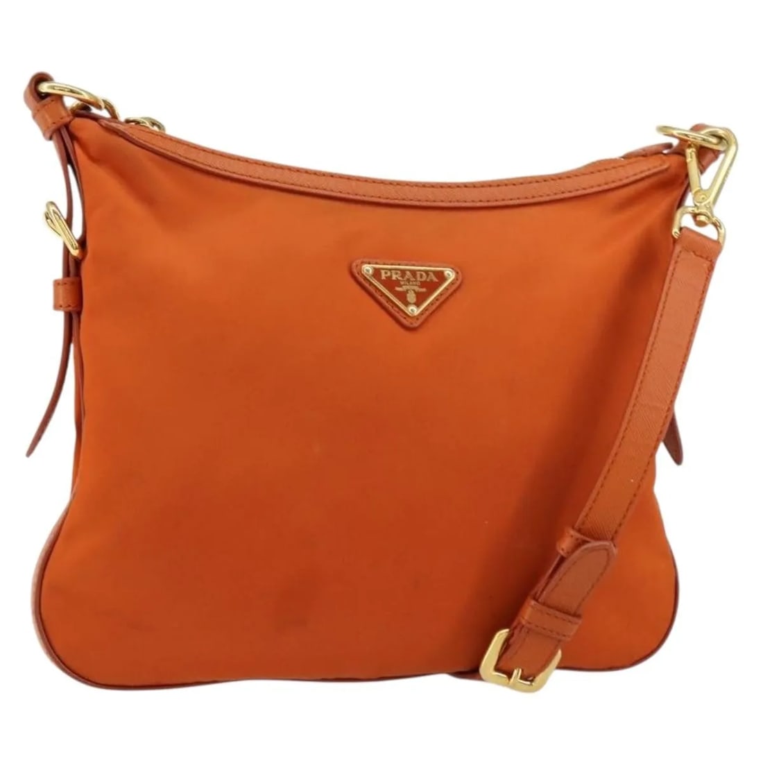 Orange Nylon Prada Flat Messenger Shoulder Bag with Leather Trim: Orange Nylon Prada Flat Messenger Shoulder Bag with Leather Trim This Prada Flat Messenger bag is crafted from durable orange nylon with leather accents, designed for female use. It features a compact