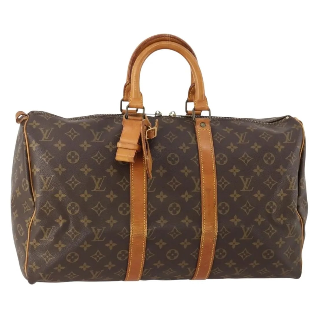 Louis Vuitton Keepall Monogram Canvas Travel Duffel Bag 45cm: Louis Vuitton Keepall Monogram Canvas Travel Duffel Bag 45cm This Louis Vuitton Keepall Bag features the iconic Monogram Canvas design in brown. Designed for unisex use, it is crafted in France and of