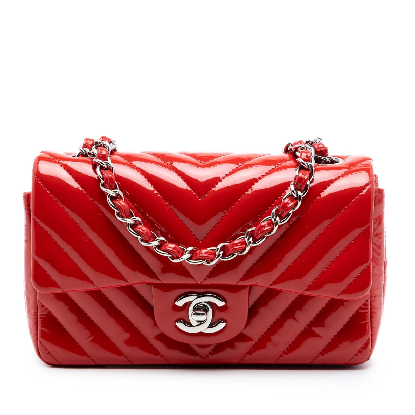 Chanel red chevron patent leather mini crossbody flap bag: Chanel red chevron patent leather mini crossbody flap bag This Chanel Mini Rectangular Classic Chevron Patent Single Flap bag is crafted from quilted patent leather in a striking red color. It feature