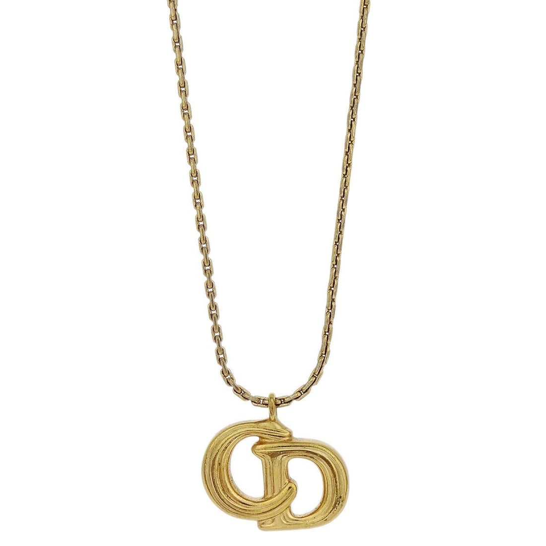 Vintage Dior Gold Plated Pendant Charm Necklace: Vintage Dior Gold Plated Pendant Charm Necklace Vintage Christian Dior pendant necklace in gold plated metal with a charm-style pendant. The piece shows wear consistent with use, including rust, disco