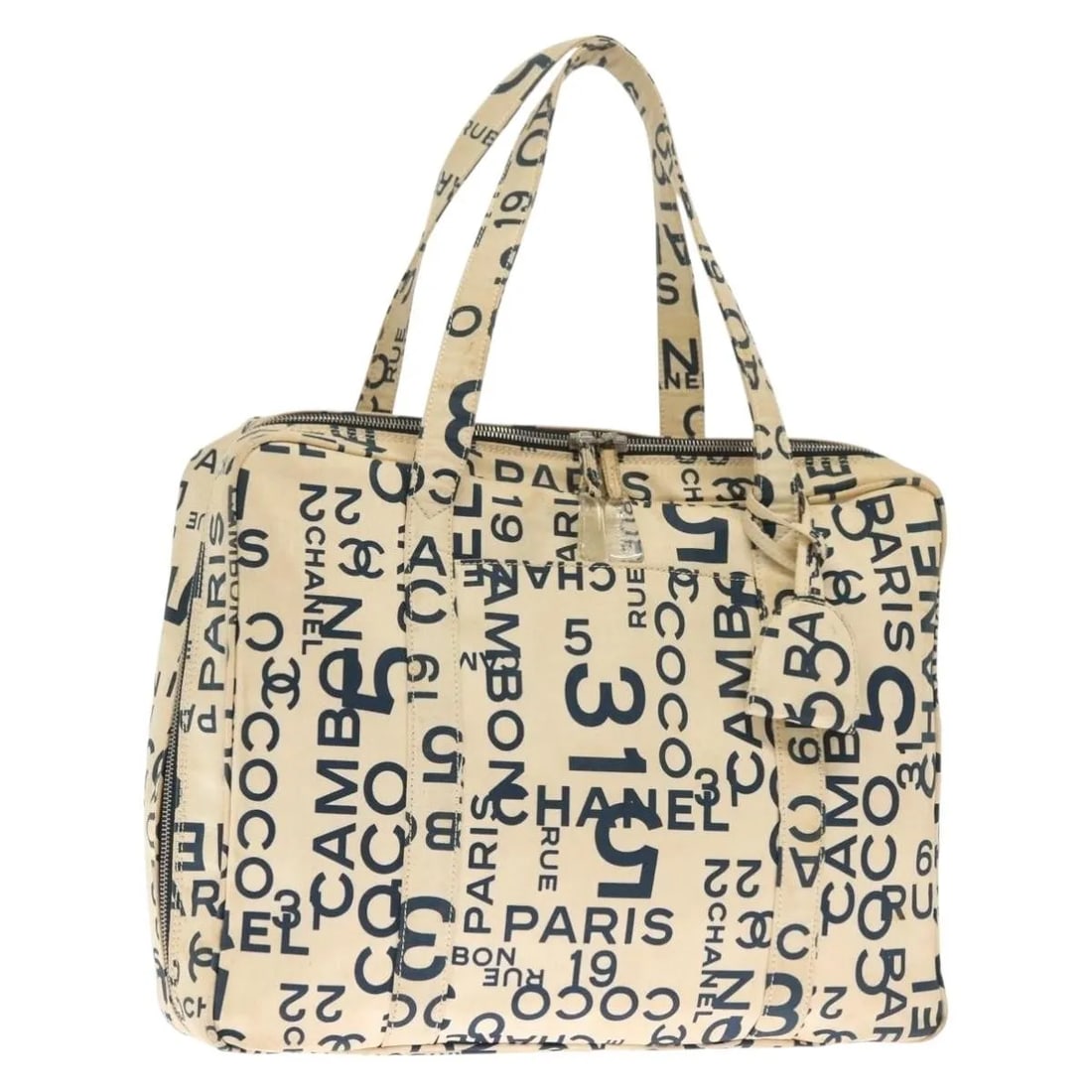 White Chanel Cambon Canvas Tote Bag 37cm Italy Made: White Chanel Cambon Canvas Tote Bag 37cm Italy Made This pre-owned Chanel Cambon tote bag for women is crafted from white canvas and features metal fittings. It shows signs of use including surface lo