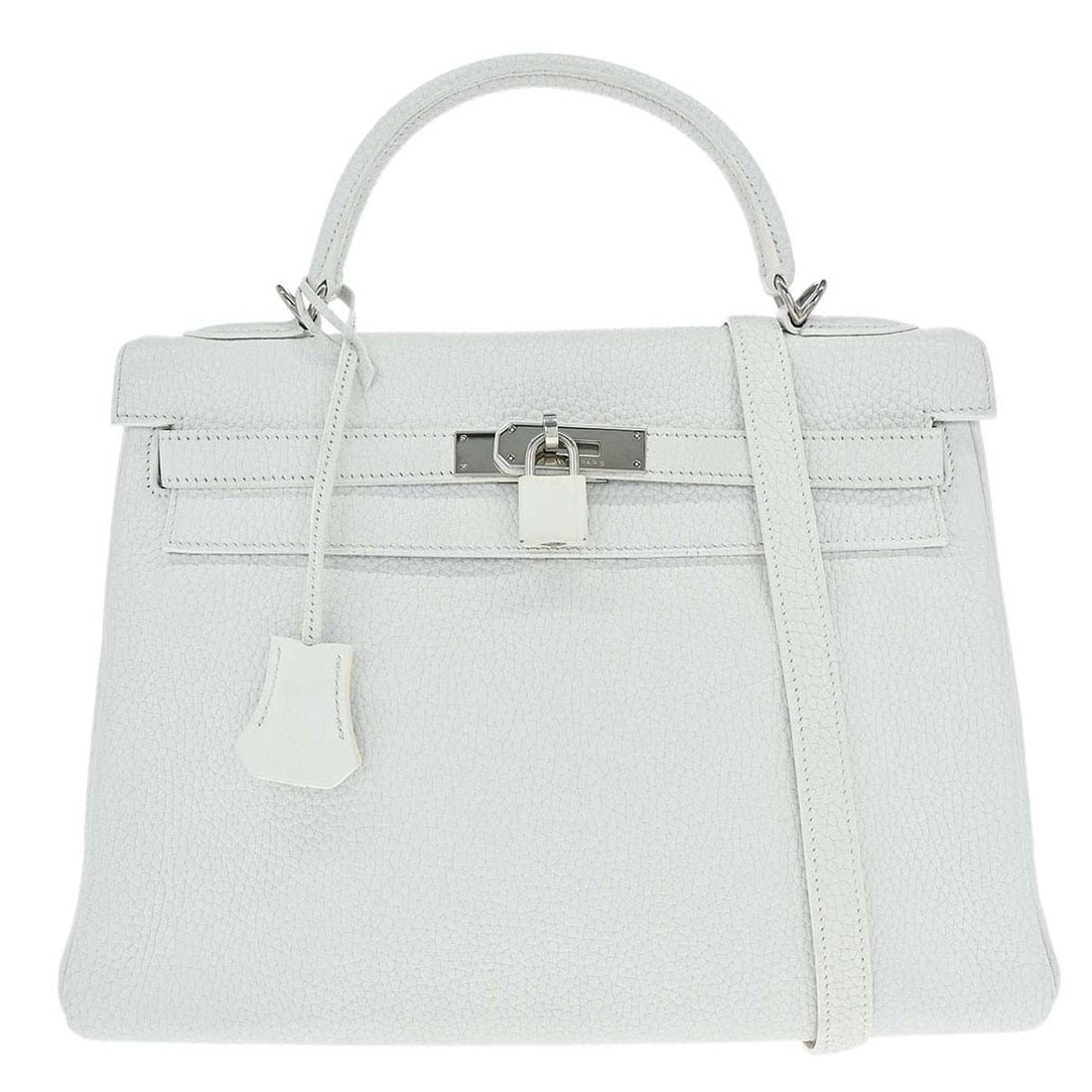 Hermes Kelly 32 Retourne White Taurillon Clemence Top Handle Bag: Hermes Kelly 32 Retourne White Taurillon Clemence Top Handle Bag Hermes Kelly 32 Retourne 2-way handbag in white Taurillon Clemence leather. This women's top handle bag features a turn-lock closure an
