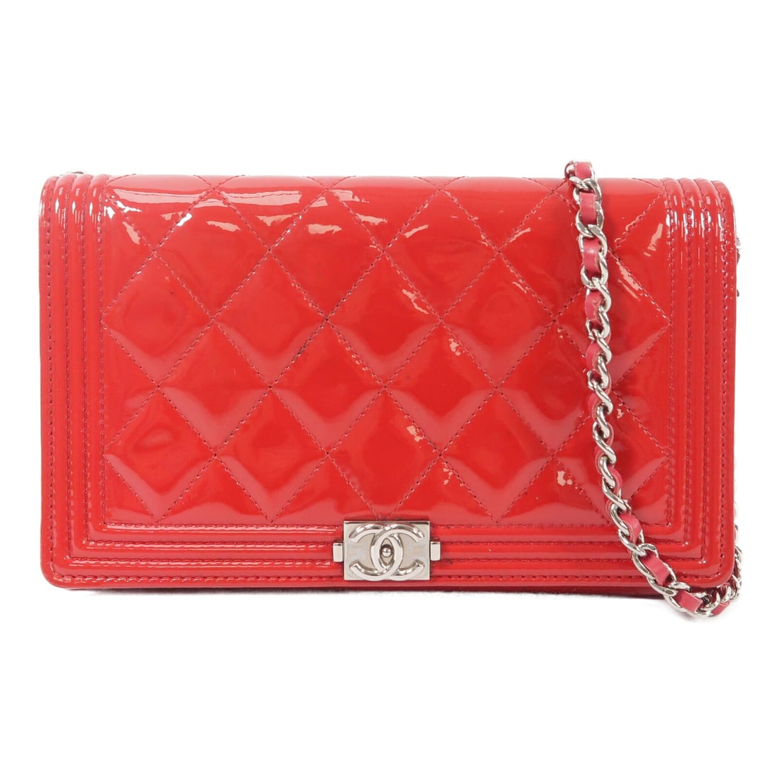 CHANEL Boy WOC Red Patent Leather Shoulder Bag: CHANEL Boy WOC Red Patent Leather Shoulder Bag This CHANEL Boy Wallet On Chain (WOC) is crafted from striking red patent leather and features the iconic CC logo with silver-tone hardware. Designed as 