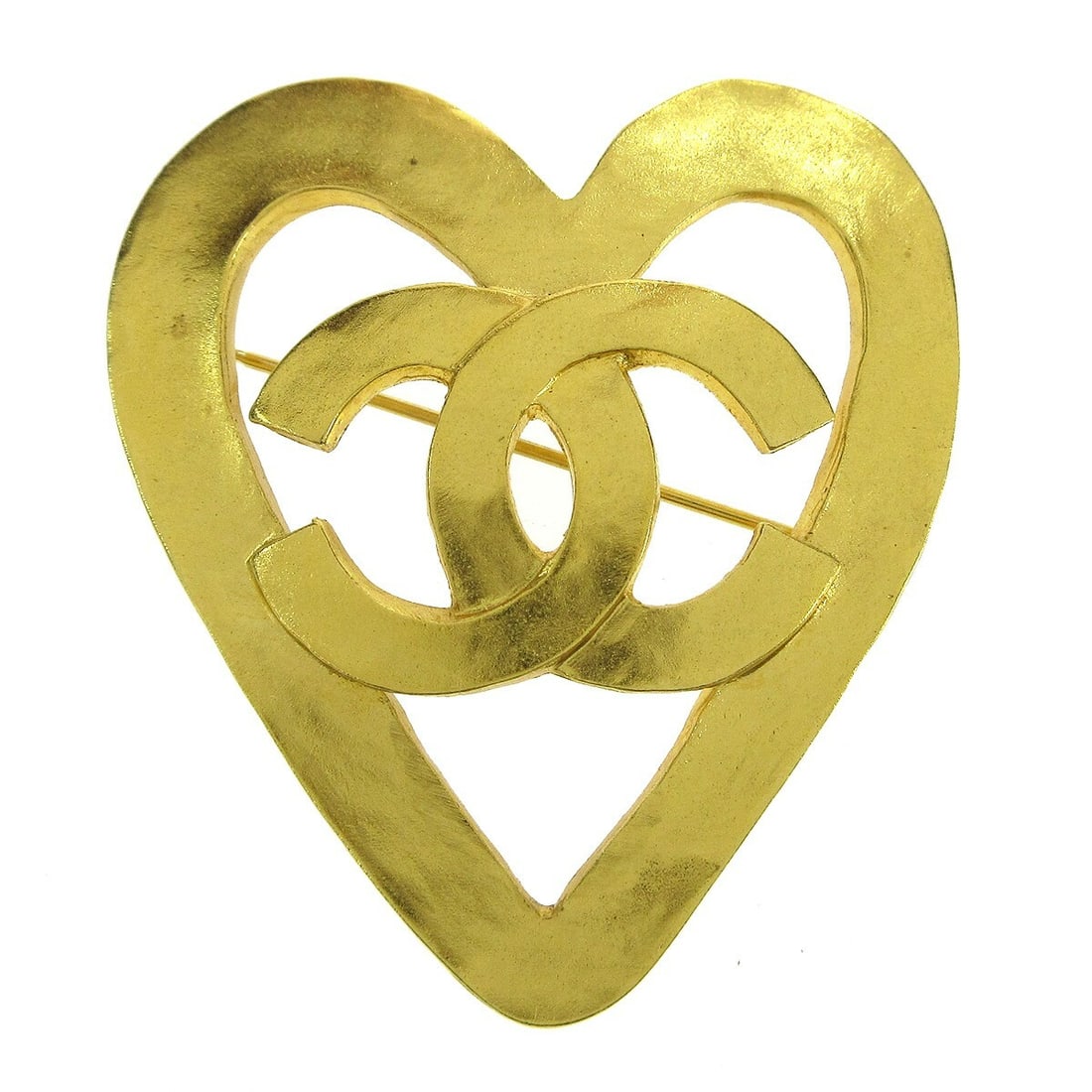 CHANEL 95P Gold Plated Heart Brooch: CHANEL 95P Gold Plated Heart Brooch Gold-plated Chanel brooch featuring a heart motif with CC logos. Made in France, this piece comes with its box and is noted in good to very good condition. Specific